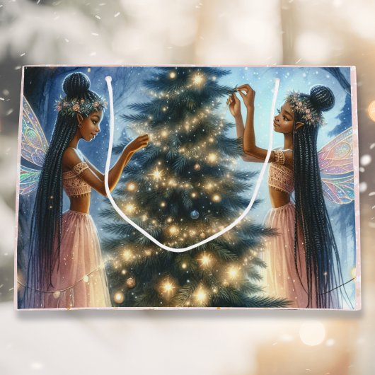 feeën versieren de kerstboom groot cadeauzakje
