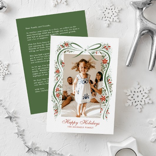 Feestelijk groen lint met poinsettia's en groen feestdagenkaart