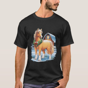 Feestelijk paard met krans in besneeuwde achtertui t-shirt