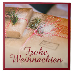 Feestelijke cadeaus als kerstmotief tegeltje