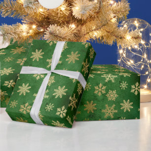 Feestelijke groene en gouden folie wintervlokken cadeaupapier