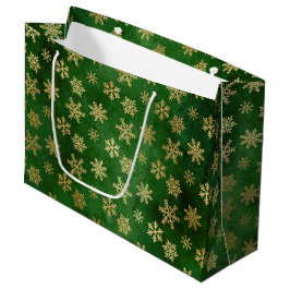 Feestelijke groene en gouden folie wintervlokken groot cadeauzakje