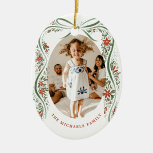 Feestelijke groene lint met poinsettia's en groen keramisch ornament
