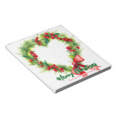 Feestelijke hartvormige kerstkrans met rode strik notitieblok (Schuin)