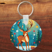 Feestelijke herten in een besneeuwd bos sleutelhanger (Voorkant)