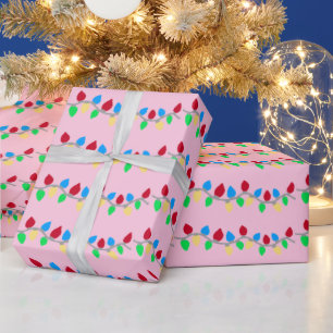 Feestelijke Kerst Slingerlichtjes op Roze Cadeaupapier