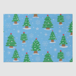 Feestelijke kerstbomen met vallende sneeuw op blau tissuepapier