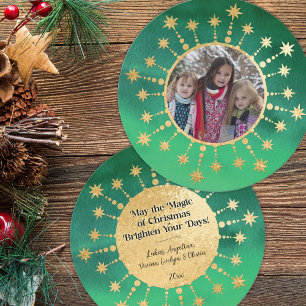 Feestelijke kerststerren: groen en goud feestdagenkaart