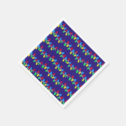 Feestelijke kerstverlichting op blauw servet (Hoek)