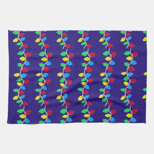 Feestelijke kerstverlichting op blauw theedoek (Horizontaal)