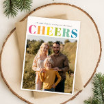 Feestelijke kleurrijke juichen kerst vier foto feestdagenkaart<br><div class="desc">Deze "Feestelijke Kleurrijke Cheers Christmas Four Photo Holiday Kaart" brengt een levendige touch aan uw vakantie groeten. Met een speels veelkleurig "Cheers"-ontwerp en een collage van gekoesterde familiemomenten, voegt het warmte en vreugde toe aan het seizoen. De heldere en moderne stijl vangt de geest van Kerstmis, terwijl de aanpasbare boodschap...</div>