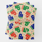 Feestelijke kleurrijke kerstwanten inpakpapier vel (In situ)