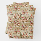 Feestelijke rendierfamilie met kerstmutsen inpakpapier vel (In situ)