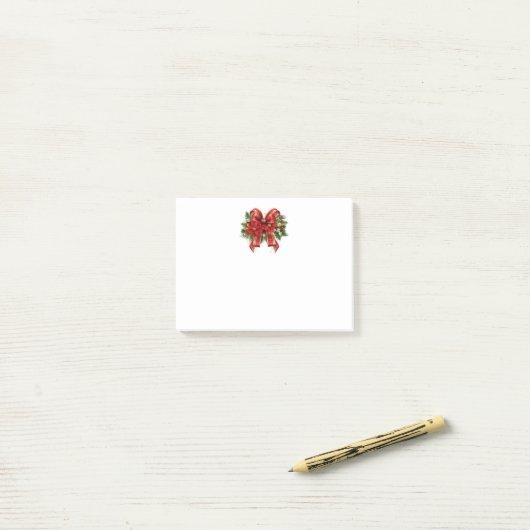 Feestelijke rode en gouden kerstboog post-it® notes (Op bureau)