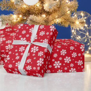 Feestelijke rode en witte wintersneeuwvlokken cadeaupapier
