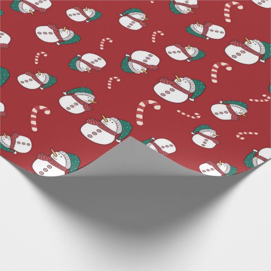 Feestelijke sneeuwman en snoepriet kerstpatroon cadeaupapier (Hoek)
