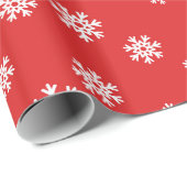 Feestelijke sneeuwvlok patroon op rode achtergrond cadeaupapier (Rol Hoek)