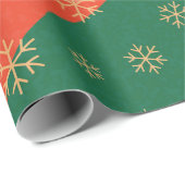 Feestelijke sneeuwvlokken op rood en groen inpakpa cadeaupapier (Rol Hoek)