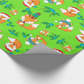 Feestelijke vossen en hulst bladeren op een helder cadeaupapier (Hoek)