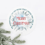 Feestelijke Winter Greenery Christmas Return Adres Ronde Sticker<br><div class="desc">Dit aanpasbare label voor kerstretouradressen is perfect voor het toevoegen van een feestelijk tintje aan uw vakantiecorrespondentie. Het ontwerp is voorzien van een gedurfde, cursieve "Merry Christmas" in levendig rood, omgeven door een cirkelvormige opstelling van elementen met een winterthema zoals dennentakken, hulstbladeren en bessen in zachte groene en witte tinten....</div>