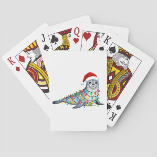 Feestelijke zeehond bedekt met kerstlichtjes pokerkaarten
