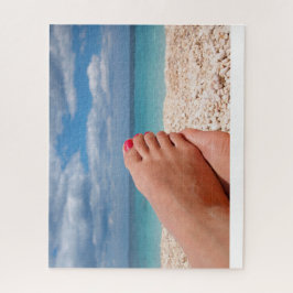 Feet met nagellak op het strand legpuzzel
