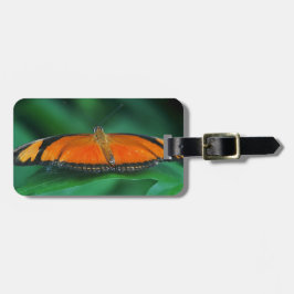 Felle oranje en zwarte vlinder op blad bagagelabel