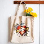 feministe tote bag<br><div class="desc">Feministische Canvas tas - Deze funky canvas tas heeft een realistisch tattoo hart met een  stijl banner en het woord Feminist. Een geweldig cadeauidee voor jonge vrouwen die hun weg vinden. Neem de dag en het show die de leiding hebben over deze geweldige feministische canvas tas.</div>