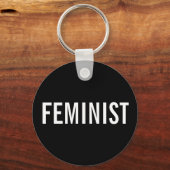 Feministische, vetgedrukte witte tekst op zwarte s sleutelhanger (Voorkant)