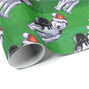 Festive Husky in Santa Hat op Green Cadeaupapier