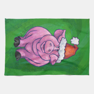 Festive Pig in Santa Hat over Groen Theedoek