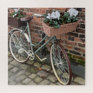 Fiets met bloemenmanden in het Engelse dorp Legpuzzel