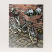 Fiets met bloemenmanden in het Engelse dorp Legpuzzel (Verticaal)