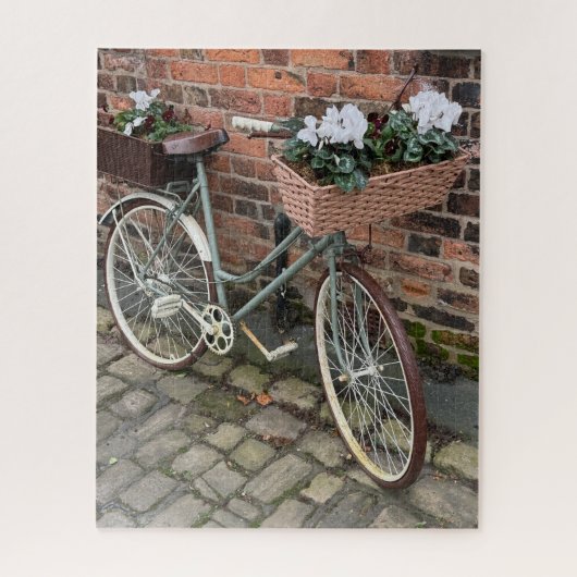 Fiets met bloemkorven in Engels dorp Legpuzzel (Verticaal)
