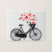  fiets met harten die uit de mand stromen legpuzzel (Horizontaal)