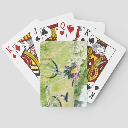Fiets met mandje bloemen in de wei pokerkaarten (Achterkant)