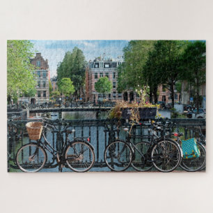 Fietsen in Amsterdam. Jigzaag Puzzle Legpuzzel