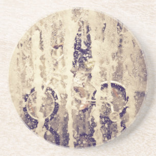 Fietsen in de regen zandsteen onderzetter