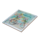 Fietsen met bloemmanden op blauwe schoot tegeltje (Zijkant)