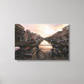 Fietsen op zonsondergang in Amsterdam Canvas Afdruk (Voorkant)
