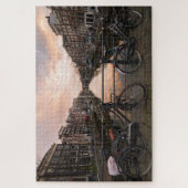 Fietsen op zonsondergang in Amsterdam Legpuzzel (Verticaal)