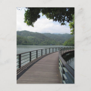 Fietsenbrug over water briefkaart