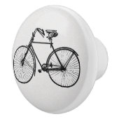  fietskeubellade trekt zwart wit aan keramische knop (Rechts)