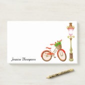 Fietsprogramma met mand bloemen na de presentatie post-it® notes (Op bureau)