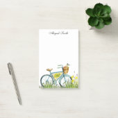 Fietsprogramma met mand bloemen na de presentatie post-it® notes (Kantoor)