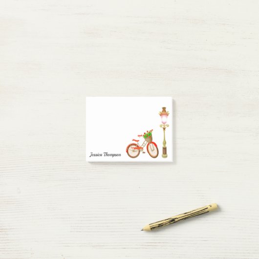 Fietsprogramma met mand bloemen na de presentatie post-it® notes (Op bureau)