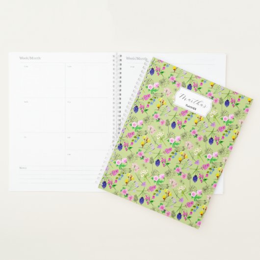 Fijne aquarel wilde bloemen op groen planner (Display)