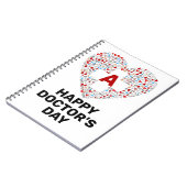 Fijne artsendag met medische hartmonogram notitieboek (Linkerzijde)