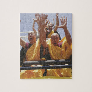 Fijne boeddhistische monniken op een roller onderz legpuzzel