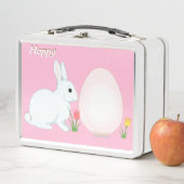 Fijne konijn, eieren en bloemen op roze (In situ)